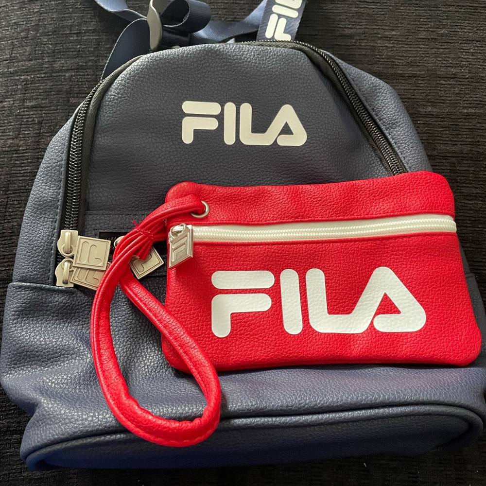 Navy Blue and red Fila 2 piece mini backpack. Never used in perfect condition
